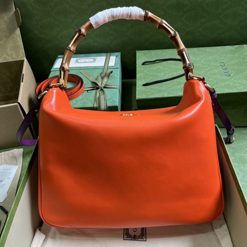 G*u*i top handle bags